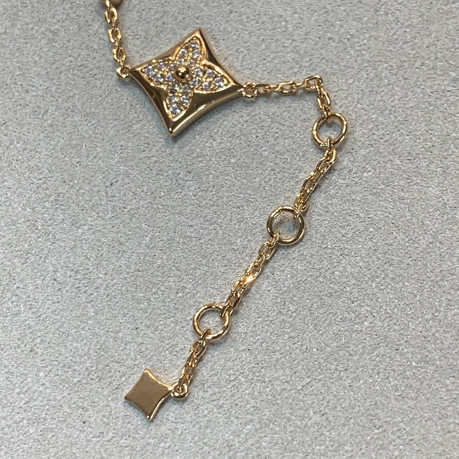 ¡®Star¡¯STAR AND SUN 4 MOTIFS GOLD DIAMONDS BRACELET