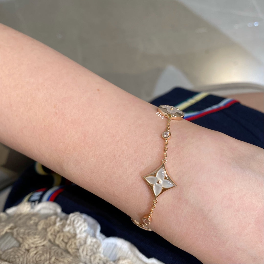 ¡®Moco¡¯STAR AND SUN 4 MOTIF WHITE MOP PINK GOLD BRACELET
